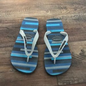 Ha Ariana’s navy striped flip flops size 9/10
